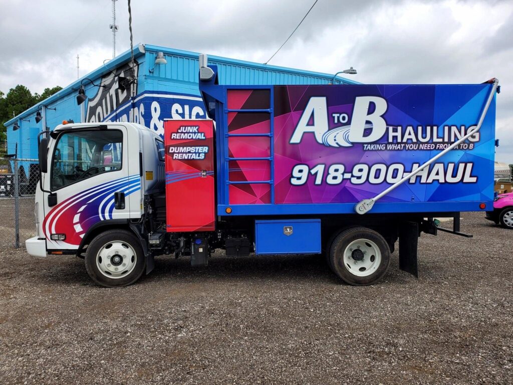 Dump truck wrap. A to B Hauling truck wrap.