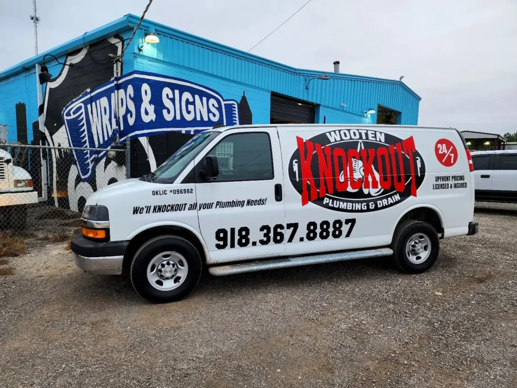 Print and Cut Graphics on a Chevy Express Van for Wooten Knockout Plumbing. Vehicle Work van wrap.